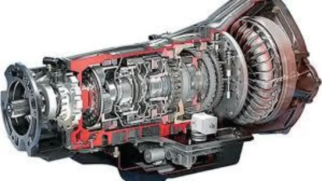 A cutaway view of a traditional hydraulic automatic transmission, showcasing its internal workings, including the torque converter and planetary gear sets.