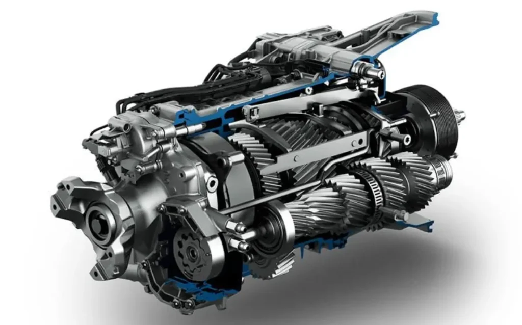 A cutaway view of an Automated Manual Transmission (AMT), showing its manual gearbox components along with actuators for automated clutch and gear operation.